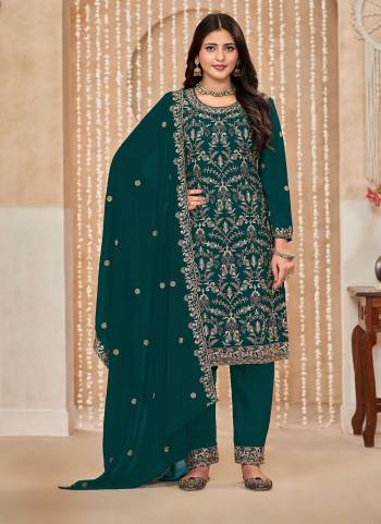 Garb These Designer Paty Wear Suit in Fine Colored Pair With Bottom And Dupatta.These Top Are Faux Georgette And Dupatta Are Fabricated On Faux Georgette Pair With Faux Georgette Bottom.Its Beautified With Santoon Inner.Its Beautified With Designer Embroidery Work.