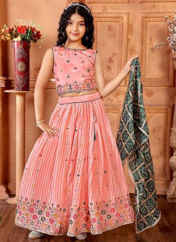 For A Designer Look,Grab These Kidswear Readymade Lehenga Choli in Fine Colored.These Lehenga And Choli Are Fabricated On Chinon Pair With Chinon Dupatta.Its Beautified With Designer Multy Thread,Sequance Embroidery Work With Printed Dupatta.