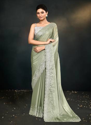 Look Attrective These Designer Party Wear Saree in Fine Colored.These Saree Are Satin Silk And Blouse Satin Silk  is Fabricated.Its Beautified Heavy Desiger Embroidery Work.