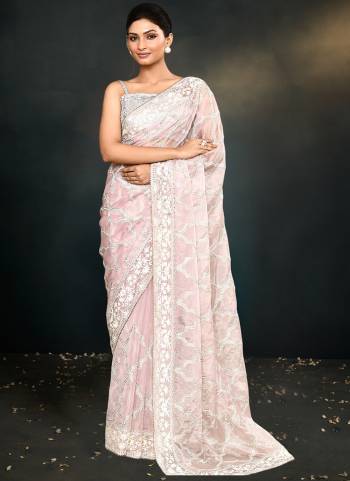 Look Attrective These Designer Party Wear Saree in Fine Colored.These Saree Are Organza Silk And Blouse Satin Silk  is Fabricated.Its Beautified Heavy Desiger Embroidery Work.