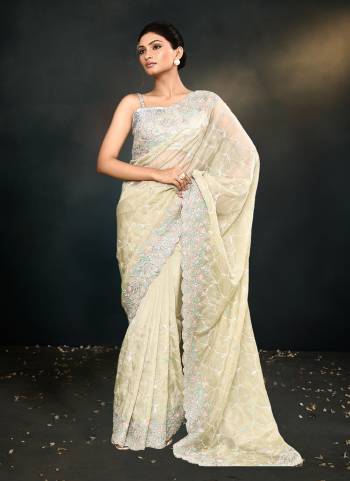 Look Attrective These Designer Party Wear Saree in Fine Colored.These Saree Are Organza Silk And Blouse Satin Silk  is Fabricated.Its Beautified Heavy Desiger Embroidery Work.