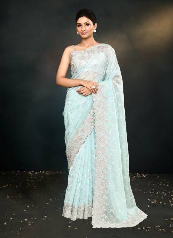 Look Attrective These Designer Party Wear Saree in Fine Colored.These Saree Are Organza Silk And Blouse Satin Silk  is Fabricated.Its Beautified Heavy Desiger Embroidery Work.