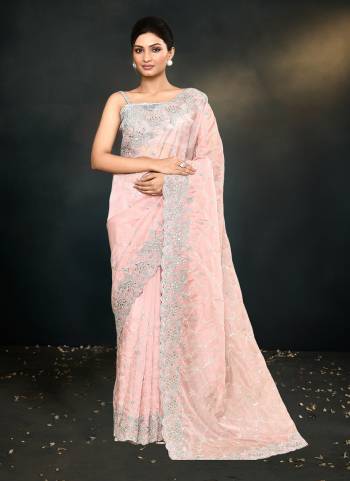 Look Attrective These Designer Party Wear Saree in Fine Colored.These Saree Are Organza Silk And Blouse Satin Silk  is Fabricated.Its Beautified Heavy Desiger Embroidery Work.