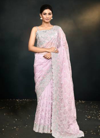 Look Attrective These Designer Party Wear Saree in Fine Colored.These Saree Are Organza Silk And Blouse Satin Silk  is Fabricated.Its Beautified Heavy Desiger Embroidery Work.