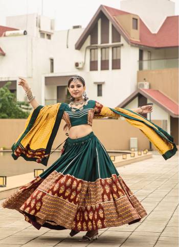 For A Designer Look,Grab These Navratri Lehenga Choli in Fine Colored.These Lehenga And Blouse Are Fabricated On Cotton Pair With Cotton Dupatta.Its Beautified With Designer Printed With Work.