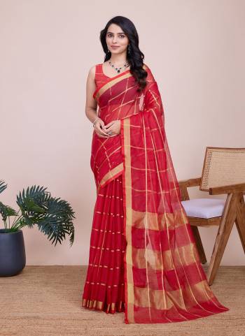 Garb This Partywear Saree Paired With Blouse.This Saree And Blouse Are Kota Doriya Based Fabric With Weaving Jari Designer. Buy This Pretty Saree Now.