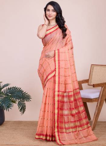 Attrective This Partywear Saree Paired With Blouse.This Saree And Blouse Are Kota Doriya Based Fabric With Weaving Jari Designer. Buy This Pretty Saree Now.