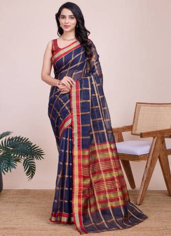 Attrective This Partywear Saree Paired With Blouse.This Saree And Blouse Are Kota Doriya Based Fabric With Weaving Jari Designer. Buy This Pretty Saree Now.