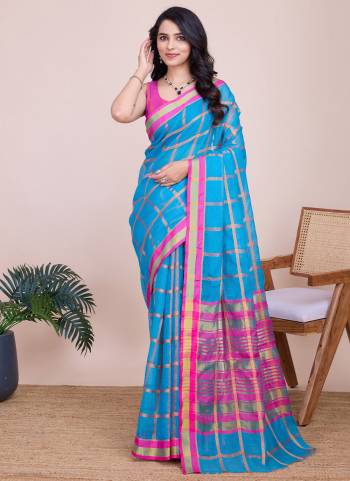 Attrective This Partywear Saree Paired With Blouse.This Saree And Blouse Are Kota Doriya Based Fabric With Weaving Jari Designer. Buy This Pretty Saree Now.