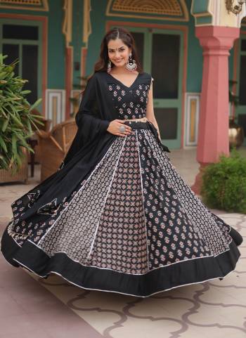 For A Designer Look,Grab These Lehenga Choli in Fine Colored.These Lehenga And Blouse Are Fabricated On Rayon Pair With Rayon Dupatta.Its Beautified With Designer Printed With Gota Pati Lace Work.