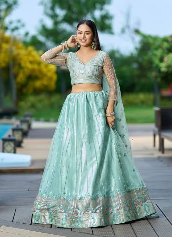 Attrective These Party Wear Lehenga Choli in Fine Colored.These Lehenga Are Net Choli Are Net And Dupatta Are Fabricated On Net Pair.Its Beautified With Designer Sequance Embroidery Work.