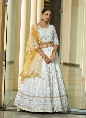 Attrective These Party Wear Lehenga Choli in Fine Colored.These Lehenga Are Georgette Choli Are Georgette And Dupatta Are Fabricated On Net Pair.Its Beautified With Designer Embroidery Work.