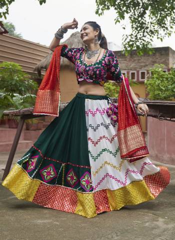 Attrective These Navratri Special Lehenga Choli in Fine Colored.These Lehenga Are Viscose Rayon And Blouse Are Viscose Rayon And Dupatta Are Fabricated On Cotton.Its Beautified With Designer Mirror,Thread Embroidery Work.