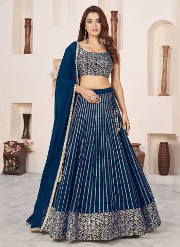 For A Designer Look,Grab These Lehenga Choli in Fine Colored.These Lehenga And Blouse Are Fabricated On Georgette Pair With Dupatta Are Georgette.Its Beautified With Designer Jari,Sequance Embroidery Work.