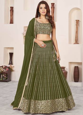 For A Designer Look,Grab These Lehenga Choli in Fine Colored.These Lehenga And Blouse Are Fabricated On Georgette Pair With Dupatta Are Georgette.Its Beautified With Designer Jari,Sequance Embroidery Work.