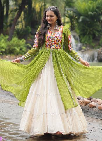 Grab These Navratri special Adult And Kids Lehenga Kurti in Fine Colored. These Lehenga Are Kora Cotton And Kurti Are Fabricated On Georgette Fabric. It is Beautified With Designer Printed With Traditional (Gamthi) Thread Work. Grace This Garba Season With This Beautiful Gamthi Work Attire.