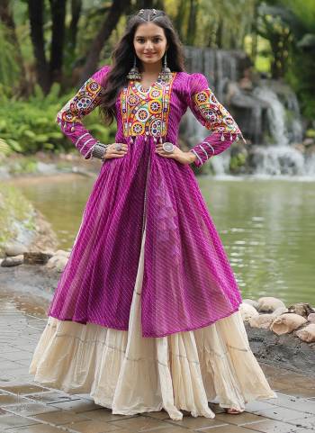 Grab These Navratri special Adult And Kids Lehenga Kurti in Fine Colored. These Lehenga Are Kora Cotton And Kurti Are Fabricated On Georgette Fabric. It is Beautified With Designer Printed With Traditional (Gamthi) Thread Work. Grace This Garba Season With This Beautiful Gamthi Work Attire.