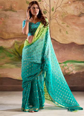 Looking These Party Wear Saree in Fine Colored.These Saree Are Georgette And Blouse is Fabricated On Handloom.Its Beautified With Weaving Jari Butti Designer With Printed Blouse.