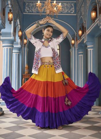 Attrective These Navratri Special Lehenga Choli in Fine Colored.These Lehenga Are Viscose Rayon And Blouse Are Viscose Rayon And Dupatta Are Fabricated On Viscose Rayon.Its Beautified With Designer Mirror,Thread Embroidery Work.