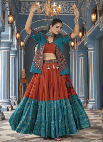 Attrective These Navratri Special Lehenga Choli in Fine Colored.These Lehenga Are Viscose Rayon And Blouse Are Viscose Rayon And Dupatta Are Fabricated On Cotton.Its Beautified With Designer Mirror,Thread Embroidery Work.