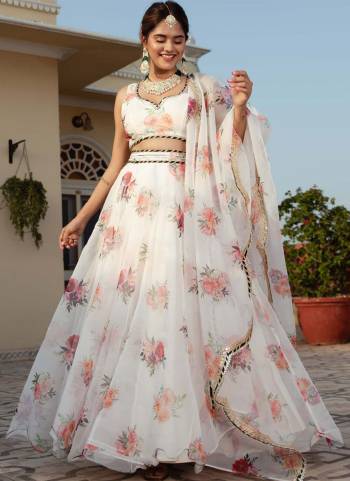 For A Designer Look,Grab These Lehenga Choli in Fine Colored.These Lehenga And Blouse Are Fabricated On Organza Pair With Dupatta Are Organza.Its Beautified With Designer Floral Printed With Embroidery Work.