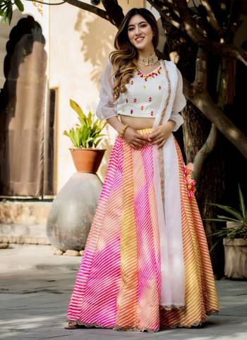 For A Designer Look,Grab These Lehenga Choli in Fine Colored.These Lehenga Are Art Silk And Blouse Are Fabricated On Organza Pair With Dupatta Are Organza.Its Beautified With Designer Digital Printed With Embroidery Work Work.