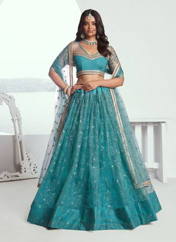 For A Different Look,Grab These Party Wear Designer Lehenga in All Over Pretty Colored Pair With Blouse And Dupatta.These Lehenga Choli And Dupatta is All Over Butterfly Net Base Fabric With Designer Cotton Thread,Sequance Embroidery Work.