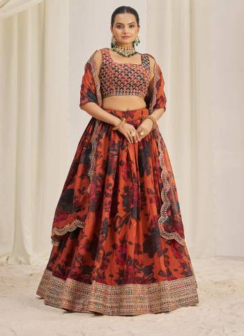 For A Designer Look,Grab These Lehenga Choli in Fine Colored.These Lehenga And Dupatta Are Fabricated On Organza Pair With Organza Blouse.Its Beautified With Designer Printed,Jari,Dori,Sequance Embroidery Work.