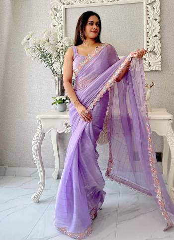 Garb These Party Wear Saree in Fine Colored.These Saree  Is Jimmy Choo And Blouse is Burberry Silk Fabricated.Its Beautified With Wevon Designer.