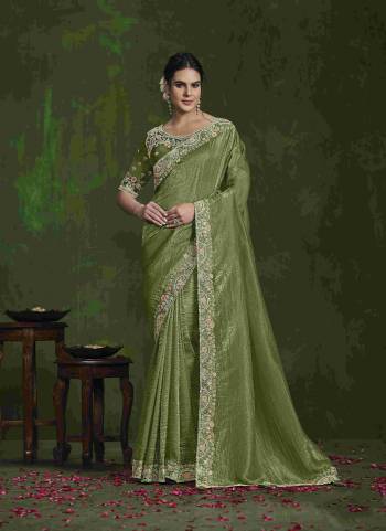 Garb These Party Wear Saree in Fine Colored.These Saree  Is Crush Paper Silk And Blouse is Satin Silk Fabricated.Its Beautified With Diamond Sequence Work.