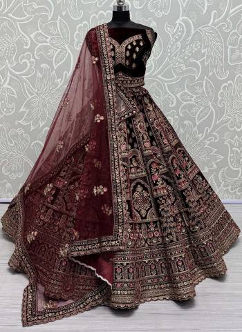 For A Fancy Designer Look,Grab These Lehenga Choli With 2 Dupatta in Fine Colored.These Lehenga And Choli Are Velvet And Dupatta Are Fabricated On Soft Net & Net Pair.Its Beautified With Designer Sequance,Thread,Dori,Jari Embroidery With Diamond Work.