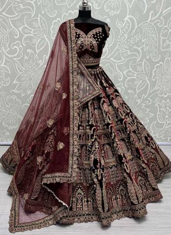 For A Fancy Designer Look,Grab These Lehenga Choli With 2 Dupatta in Fine Colored.These Lehenga And Choli Are Velvet And Dupatta Are Fabricated On Soft Net & Net Pair.Its Beautified With Designer Sequance,Thread,Dori,Jari Embroidery With Diamond Work.