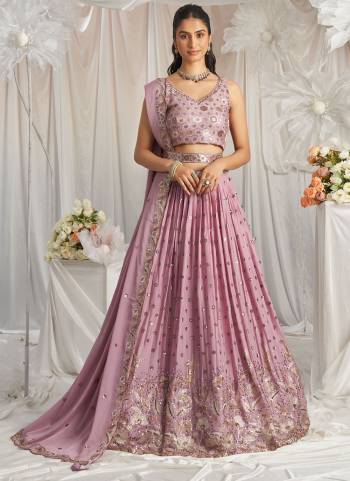 Attrective Looking This Partywear Fine Color Fancy Heavy Designer Choli And Lahenga Fabriced On Georgette And Dupatta Georgette In Fabricated Beautified With Attrective Designer Heavy Embroidery Work. Buy Now.