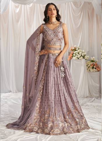 Attrective Looking This Partywear Fine Color Fancy Heavy Designer Choli And Lahenga Fabriced On Georgette And Dupatta Georgette In Fabricated Beautified With Attrective Designer Heavy Embroidery Work. Buy Now.