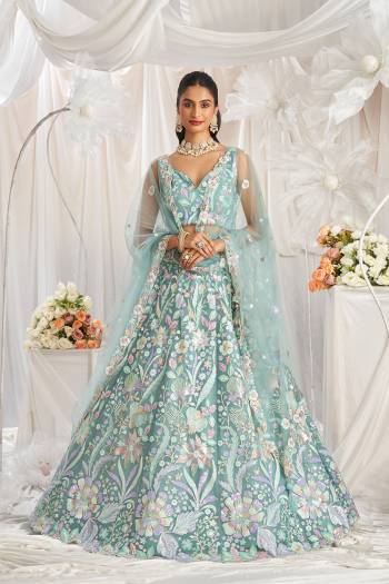 Attrective Looking This Partywear Fine Color Fancy Heavy Designer Choli And Lahenga Fabriced On Net And Dupatta Net In Fabricated Beautified With Attrective Designer Heavy Embroidery Work. Buy Now.