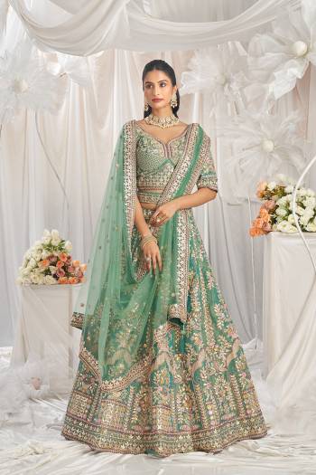 Attrective Looking This Partywear Fine Color Fancy Heavy Designer Choli And Lahenga Fabriced On Tissue And Dupatta Net In Fabricated Beautified With Attrective Designer Heavy Embroidery Work. Buy Now.