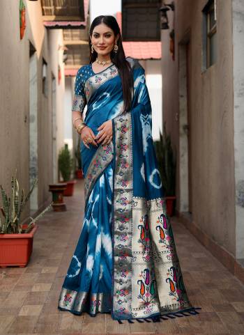 Garb These Festive Wear Saree in Fine Colored.These Saree And Blouse is Fabricated On Paithani Silk.Its Beautified With Wevon Border Pallu Designer With Saburi Printed.