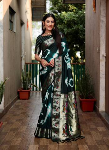 Garb These Festive Wear Saree in Fine Colored.These Saree And Blouse is Fabricated On Paithani Silk.Its Beautified With Wevon Border Pallu Designer With Saburi Printed.