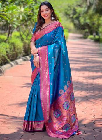 Looking These Party Wear Saree in Fine Colored.These Saree And Blouse is Fabricated On Paithani Silk.Its Beautified With Weaving Meenakari Designer.