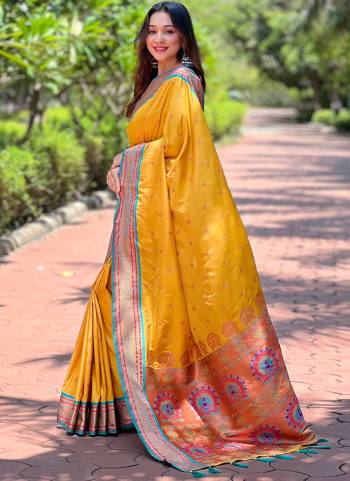 Looking These Party Wear Saree in Fine Colored.These Saree And Blouse is Fabricated On Paithani Silk.Its Beautified With Weaving Meenakari Designer.