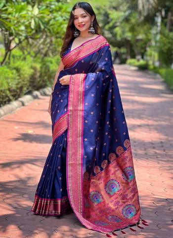 Looking These Party Wear Saree in Fine Colored.These Saree And Blouse is Fabricated On Paithani Silk.Its Beautified With Weaving Meenakari Designer.