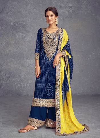 Looking These Designer Plazzo Suits in Fine Colored Pair With Dupatta.These Top And Dupatta Are Fabricated On Chinon Pair With Chinon Bottom.Its Beautified With Bandhani Printed,Designer Embroidery Work