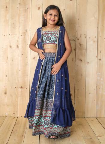 For A Designer Look,Grab These Kidswear Readymade Lehenga Choli in Fine Colored.These Choli Are Fabricated On Silk Pair With Silk Lehenga And Georgette Shrug.Its Beautified With Digital Printed With Sequance Work.