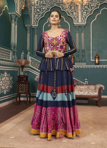 Attrective These Navratri Special Lehenga Choli in Fine Colored.These Lehenga Are Maska Silk And Blouse Are Viscose Rayon And Jacket Are Fabricated On Maska Silk.Its Beautified With Designer Embroidery Work.