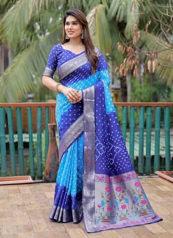 Garb These Party Wear Saree in Fine Colored.These Saree And Blouse is Fabricated On Dola Silk.Its Beautified With Wevon Paithani Pallu Border Designer With Handmade Bandhej Printed.