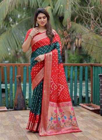 Garb These Party Wear Saree in Fine Colored.These Saree And Blouse is Fabricated On Dola Silk.Its Beautified With Wevon Paithani Pallu Border Designer With Handmade Bandhej Printed.