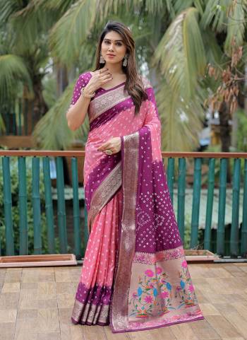 Garb These Party Wear Saree in Fine Colored.These Saree And Blouse is Fabricated On Dola Silk.Its Beautified With Wevon Paithani Pallu Border Designer With Handmade Bandhej Printed.