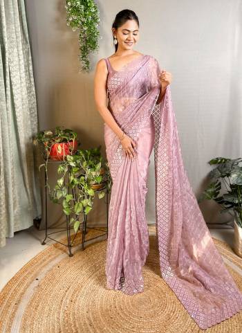 Garb These Party Wear Saree in Fine Colored.These Saree Are Crystal Silk And Blouse is Crystal Silk Fabricated.Its Beautified With Designer Sequance Embroidery Work.