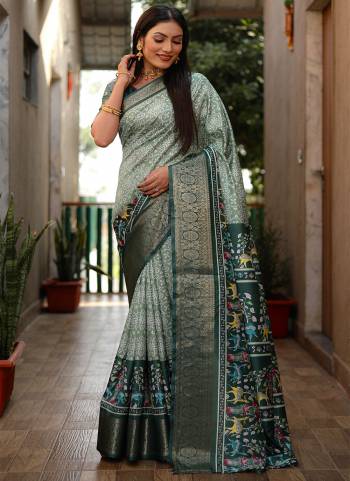 Looking These Party Wear Saree in Fine Colored.These Saree And Blouse is Fabricated On Dola Silk.Its Beautified With Wevon Border Designer With Digital Kalamkari,Bandhej Printed.