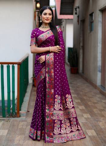 Attrctive These Party Wear Saree in Fine Colored.These Saree And Blouse is Fabricated On Paithani Silk.Its Beautified With Wevon Border Pallu Designer With Bandhej Printed.